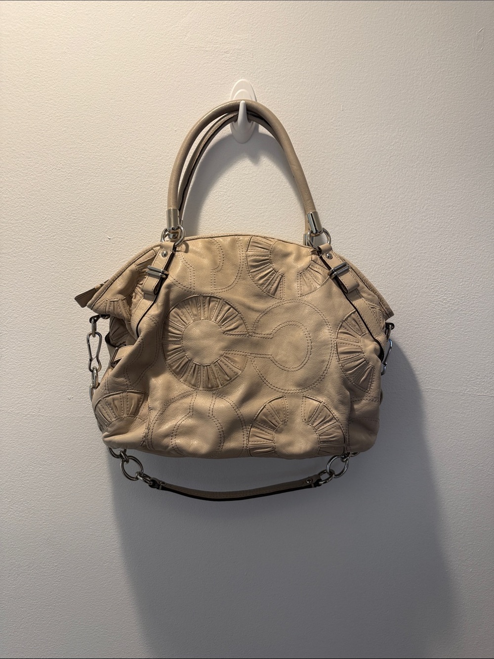 Coach Beige Leather Satchel with Circular Embossed Design